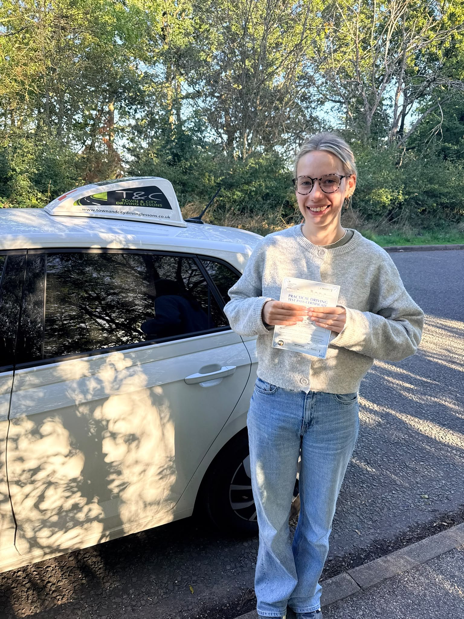 Evie celebrating her driving test pass at Worksop